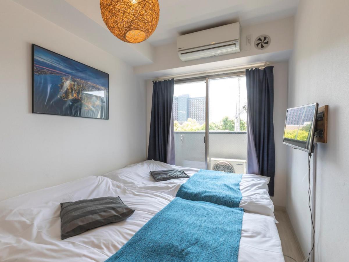 Tabist Gloire Osaka Apartment Bagian luar foto