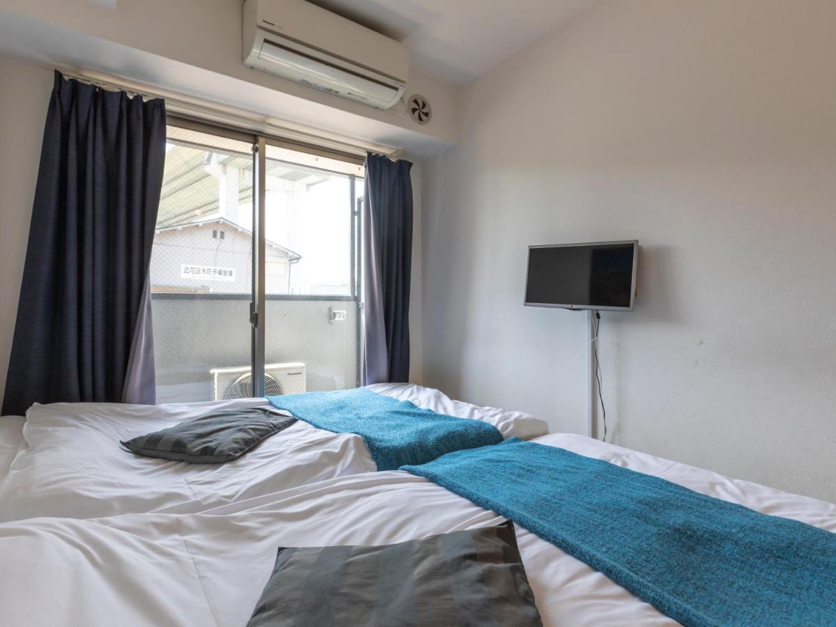 Tabist Gloire Osaka Apartment Bagian luar foto